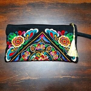 Ethnic boho fabric embroidered wristlet, clutch, zipper ,10" by 5" .